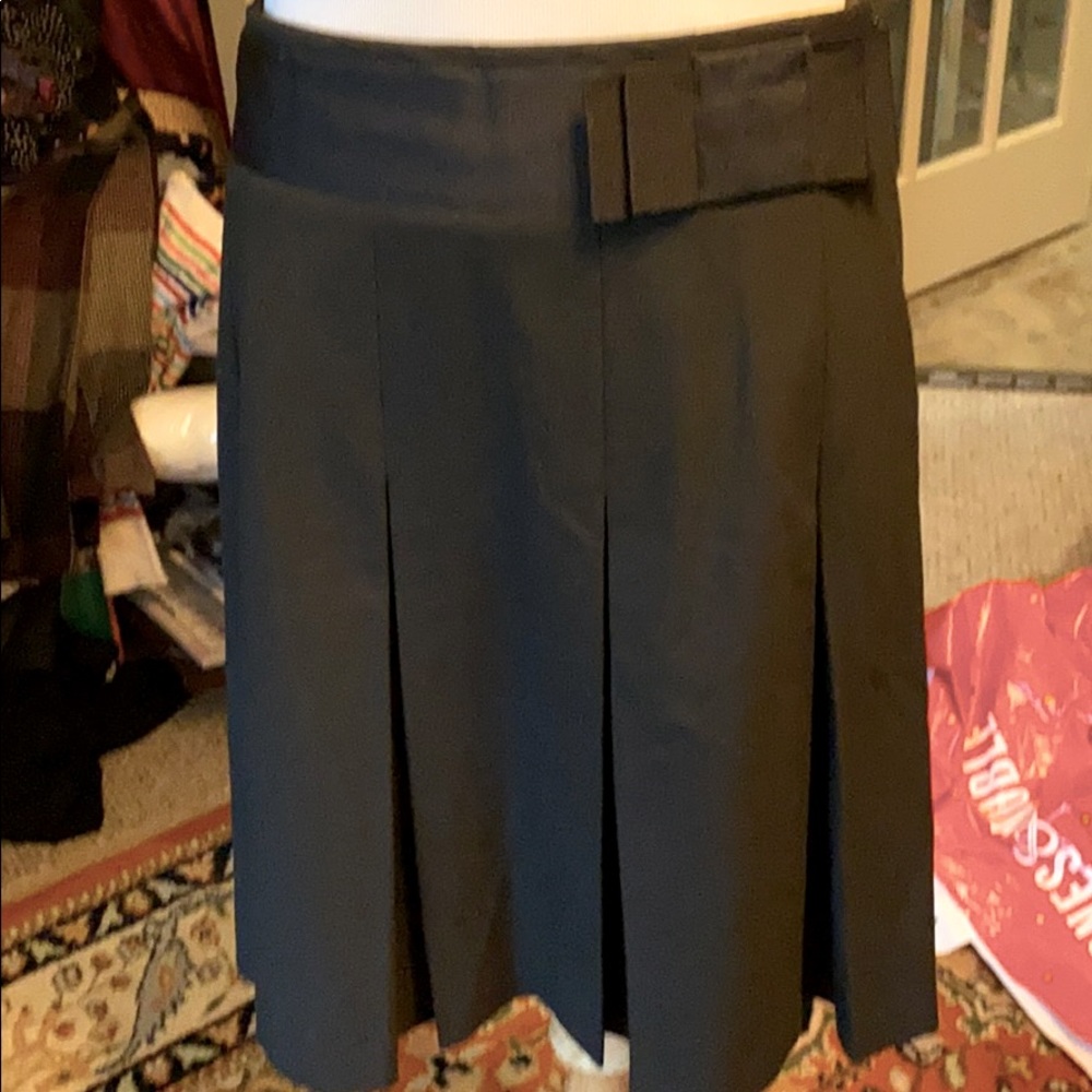 Black pleated mini skirt